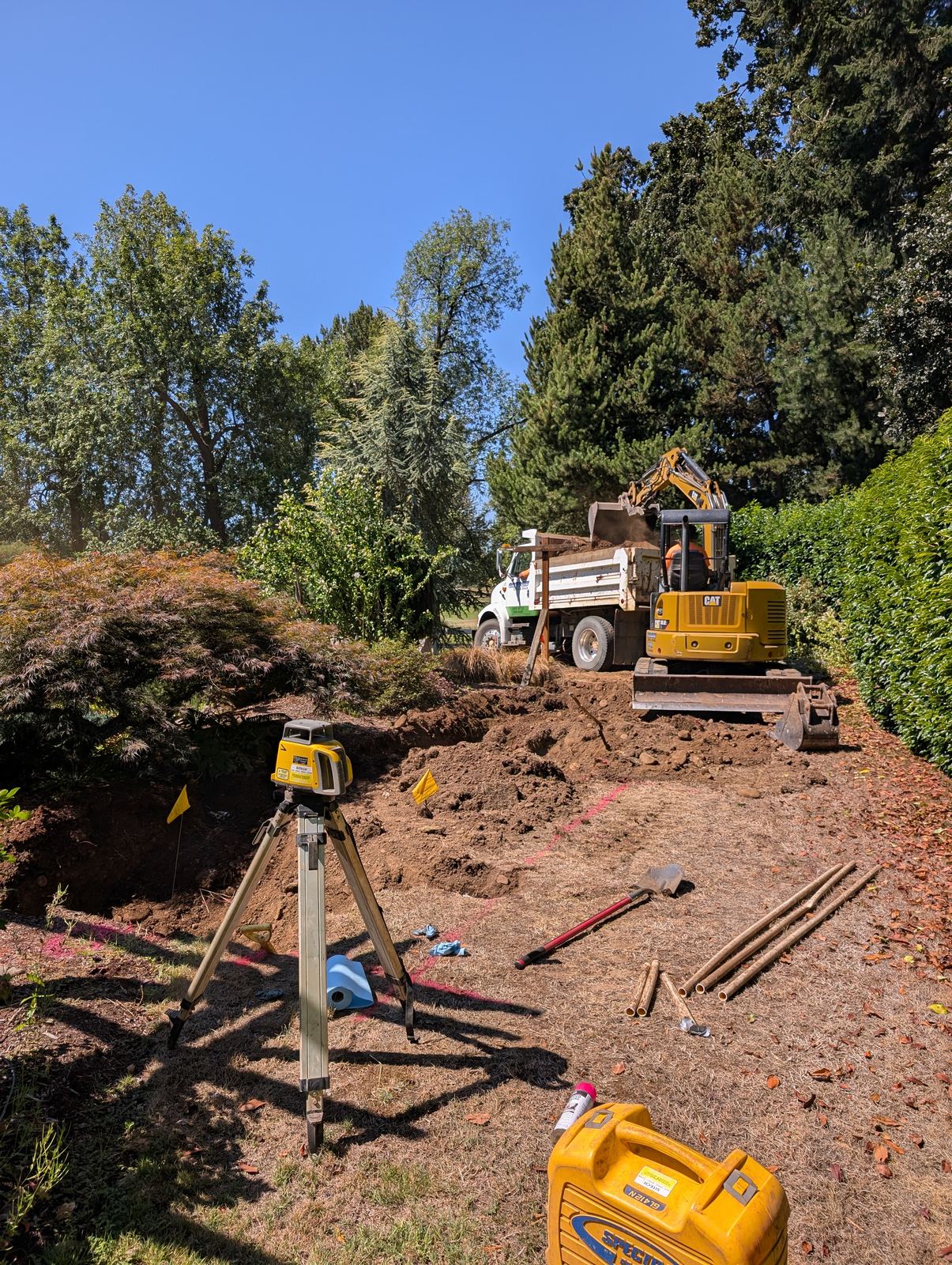 Survey equipment and machinery set up on site